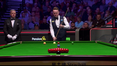 Shaun Murphy scratches off the break — the cue ball deflects into the pocket after contact with the pack